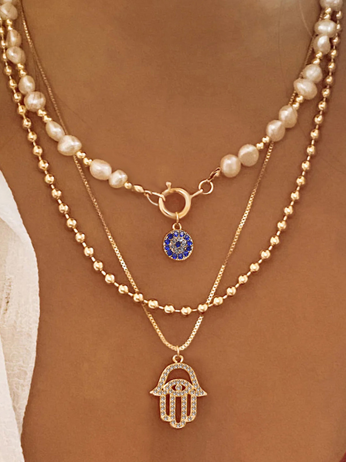 Şık Görünüm İçin İnci Ve Hamsa El Desenli Çocuk Bezi Kolye Seti